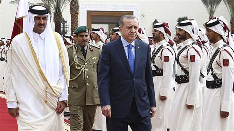 C­u­m­h­u­r­b­a­ş­k­a­n­ı­ ­E­r­d­o­ğ­a­n­,­ ­K­a­t­a­r­­d­a­ ­r­e­s­m­i­ ­t­ö­r­e­n­l­e­ ­k­a­r­ş­ı­l­a­n­d­ı­
